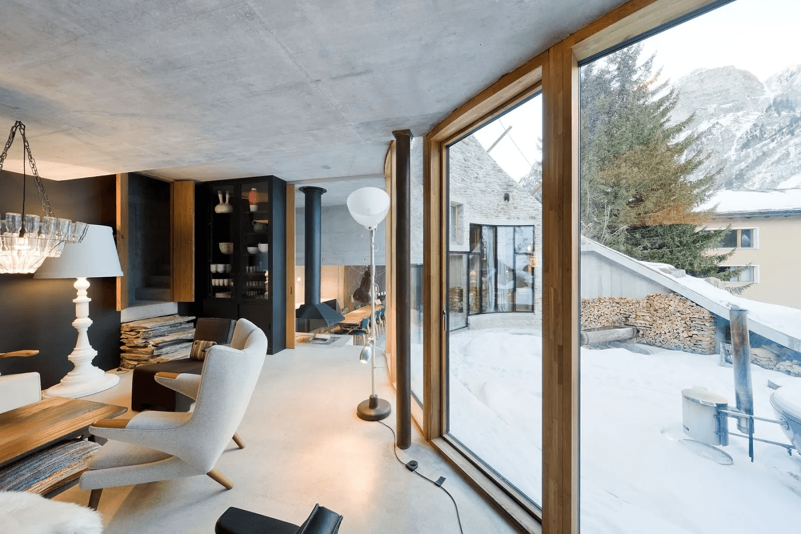 A spartan interior with pale spruce wood covering the floor, walls, and ceiling